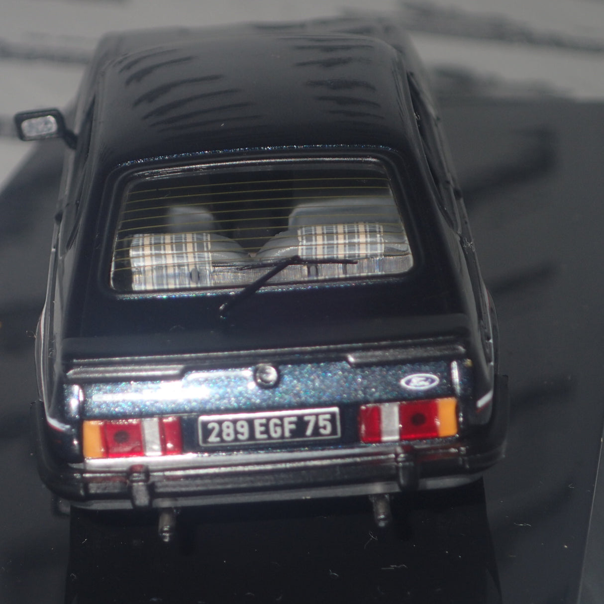 IXO Models CLC199 - 1/43 Scale 1982 Ford 2.8L Injection in Two-Tone Grey Metallic Diecast Model Replica