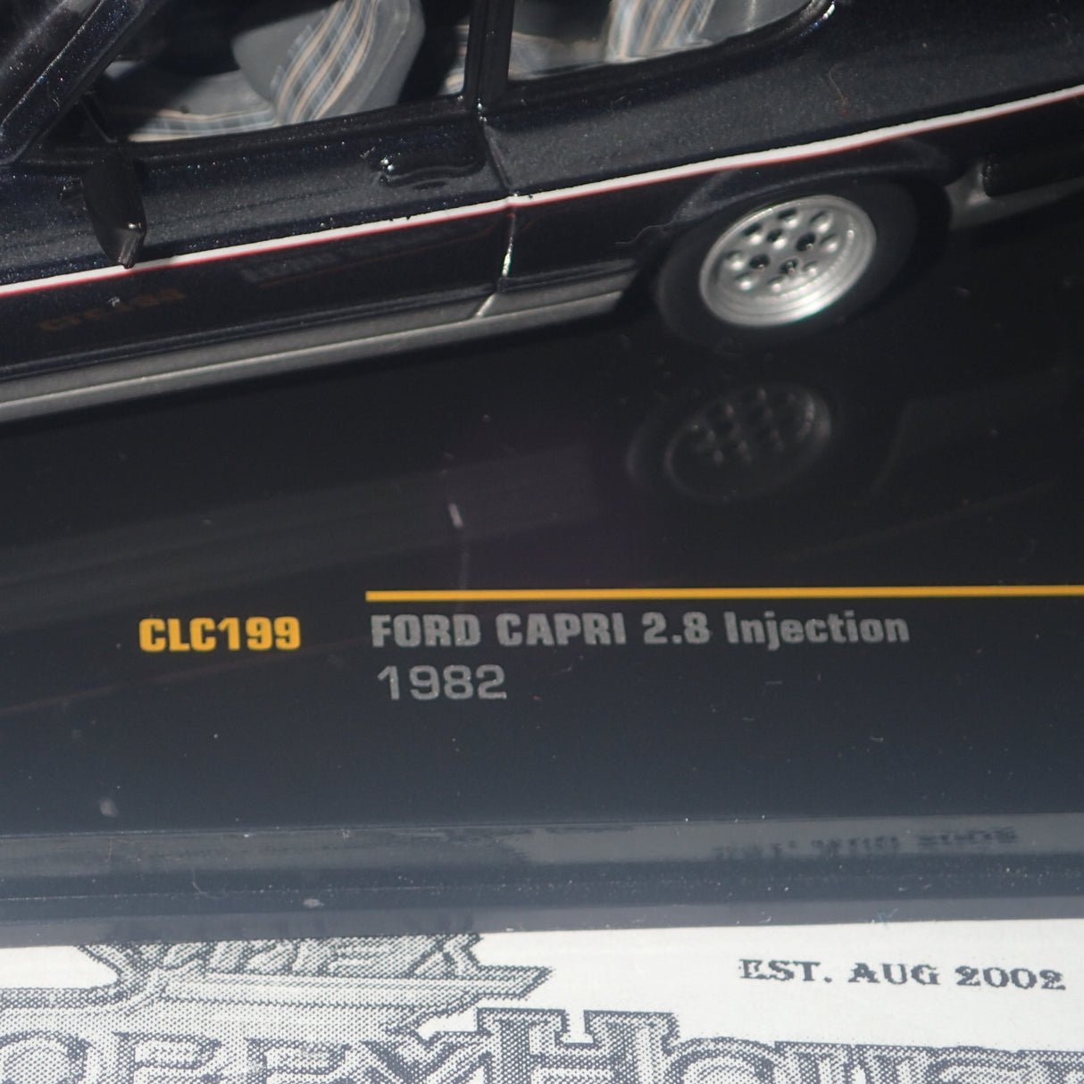 IXO Models CLC199 - 1/43 Scale 1982 Ford 2.8L Injection in Two-Tone Grey Metallic Diecast Model Replica