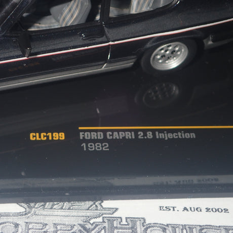 IXO Models CLC199 - 1/43 Scale 1982 Ford 2.8L Injection in Two-Tone Grey Metallic Diecast Model Replica