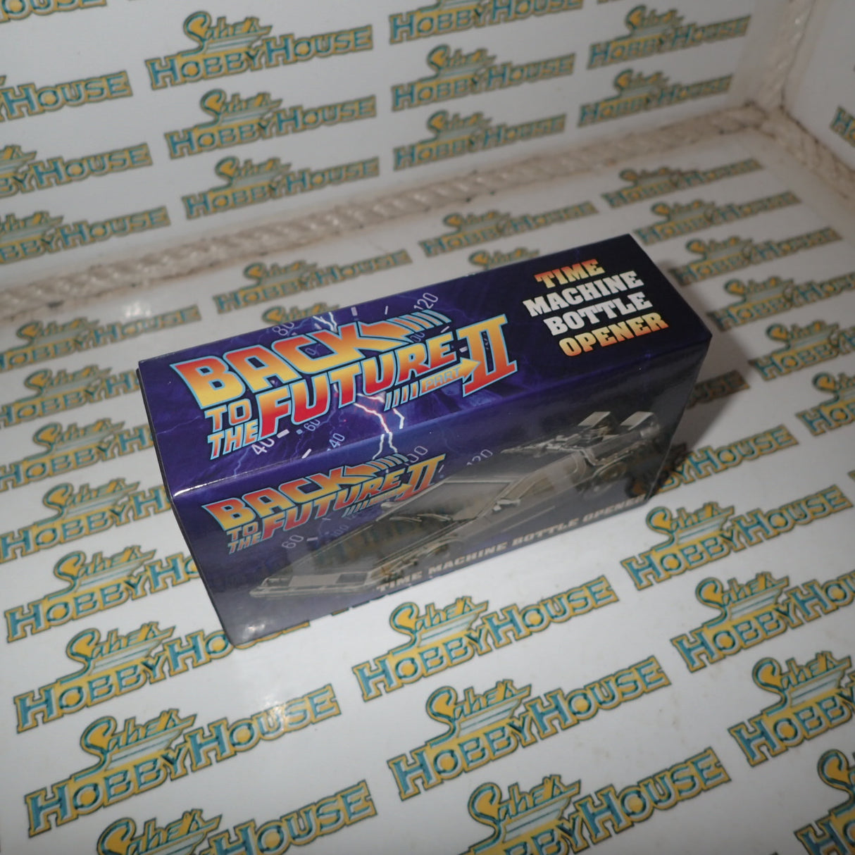 Diamond Select Toys DSTJUN152100 - Back to the Future II - Delorean Time Machine Bottle Opener