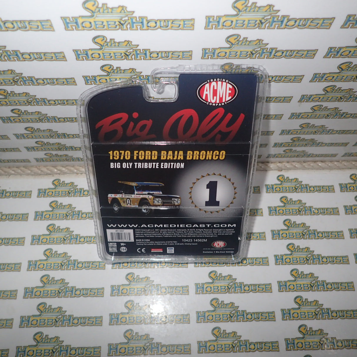ACME GL-51487 - 1/64 Scale 1970 FORD BAJA BRONCO - BIG OLY TRIBUTE EDITION - ACME EXCLUSIVE Diecast Scale Model Replica
