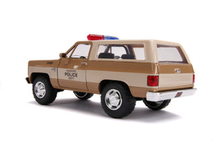 Jada Toys 31111 - 1/24 Scale - Hollywood Rides Series - Stranger Things - Hopper's Chevy Blazer with Police Badge Diecast Scale Model Replica