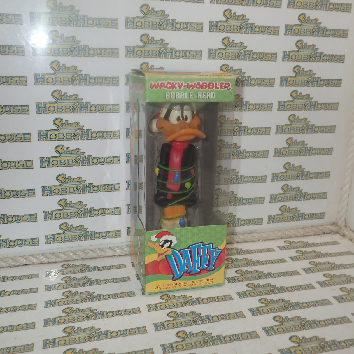 Funko FUN8076 – Looney Tunes DAFFY X-Mas Bobble Head 15Cm Wacky Wobbler