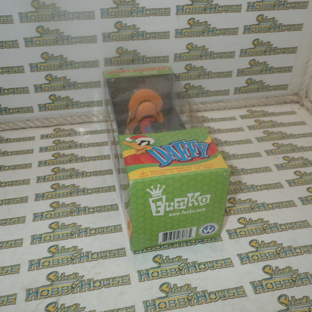 Funko FUN8076 – Looney Tunes DAFFY X-Mas Bobble Head 15Cm Wacky Wobbler