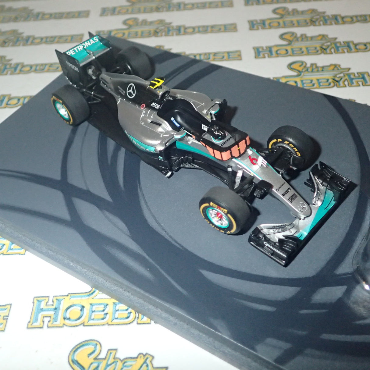 Spark S5025 1/43 Scale - Mercedes AMG Petronas Motorsport F1 W07 Hybrid #6 Nico Rosberg Abu Dhabi GP World Champion 2016 Scale Model Replica with Figure