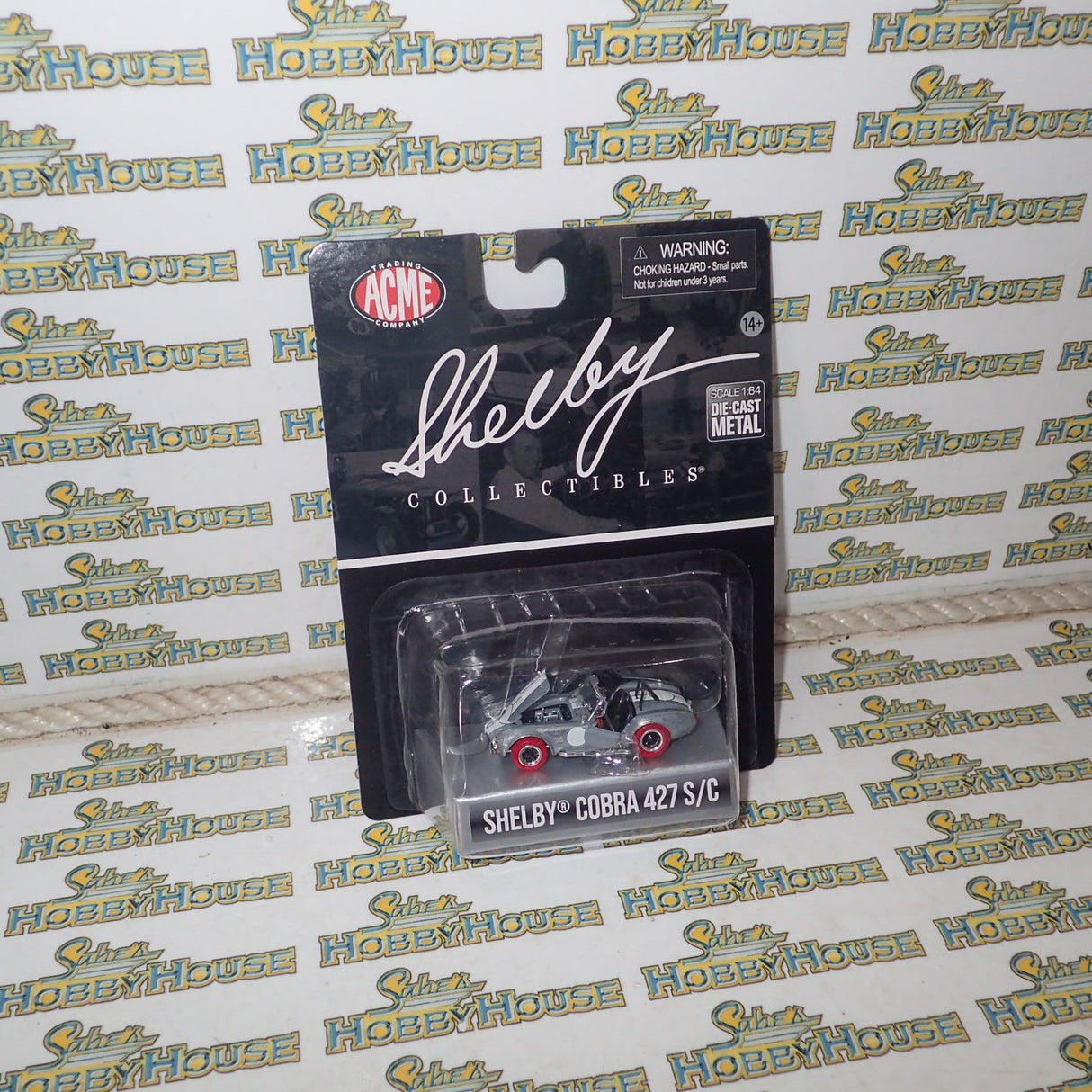 Shelby Collectibles SC-705-M - 1/64 1965 Shelby Cobra 427 S/C - Raw Metal w/ Red Tires