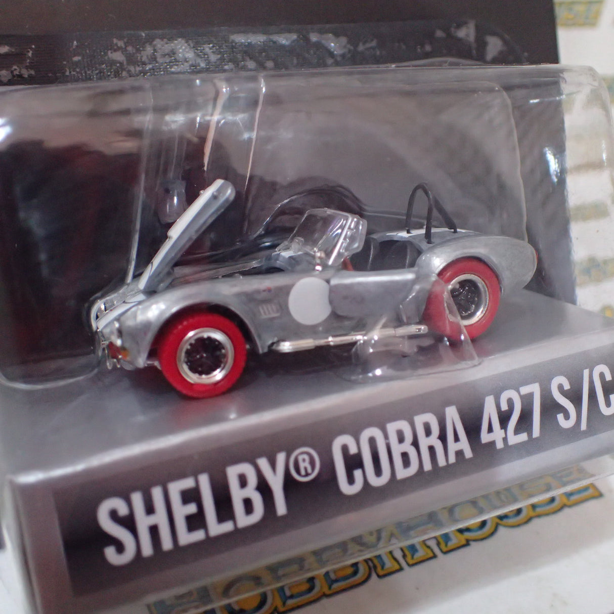 Shelby Collectibles SC-705-M - 1/64 1965 Shelby Cobra 427 S/C - Raw Metal w/ Red Tires
