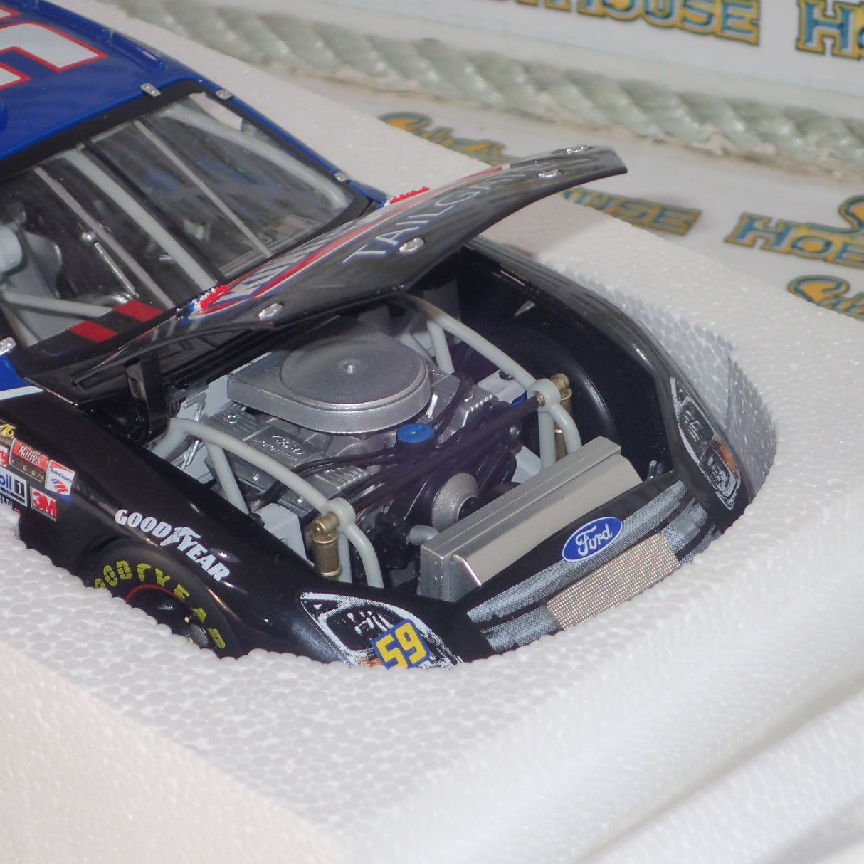 CFS Checkered Flag Sports - 1/24 Scale - Champion Series - 2008 Ambrose #59 “Kingsford Tailgate” Ford Fusion Diecast Model Replica
