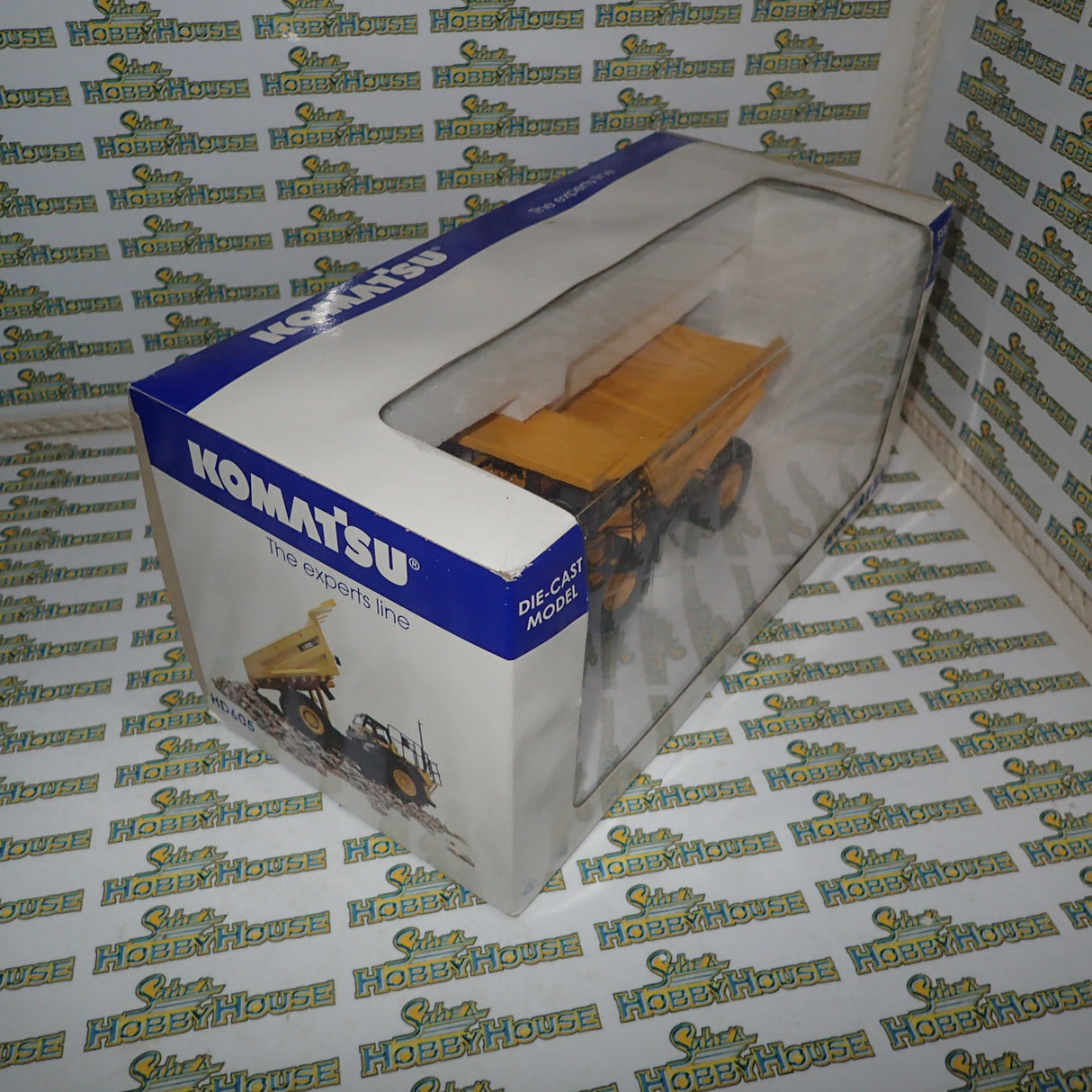 Universal Hobbies 8009U - 1/50 Scale Kamatsu HD605 Dump Truck the experts line