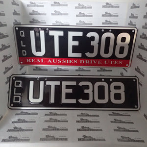 Real Queensland Plates. UTE308 with words REAL AUSSIES DRIVE UTES below.