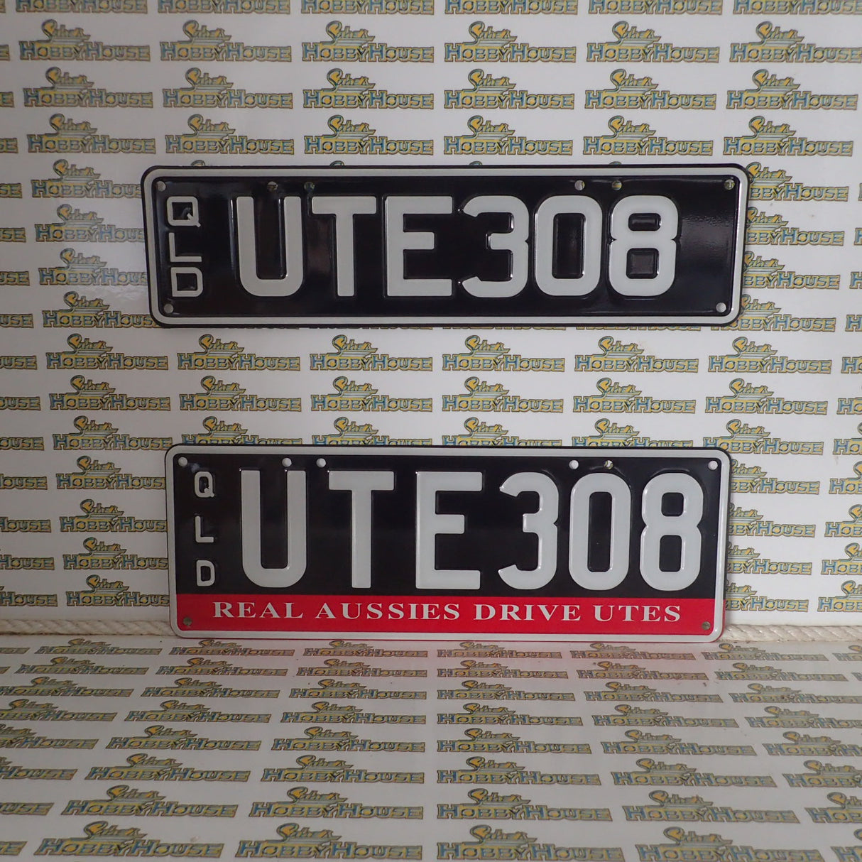Real Queensland Plates. UTE308 with words REAL AUSSIES DRIVE UTES below.